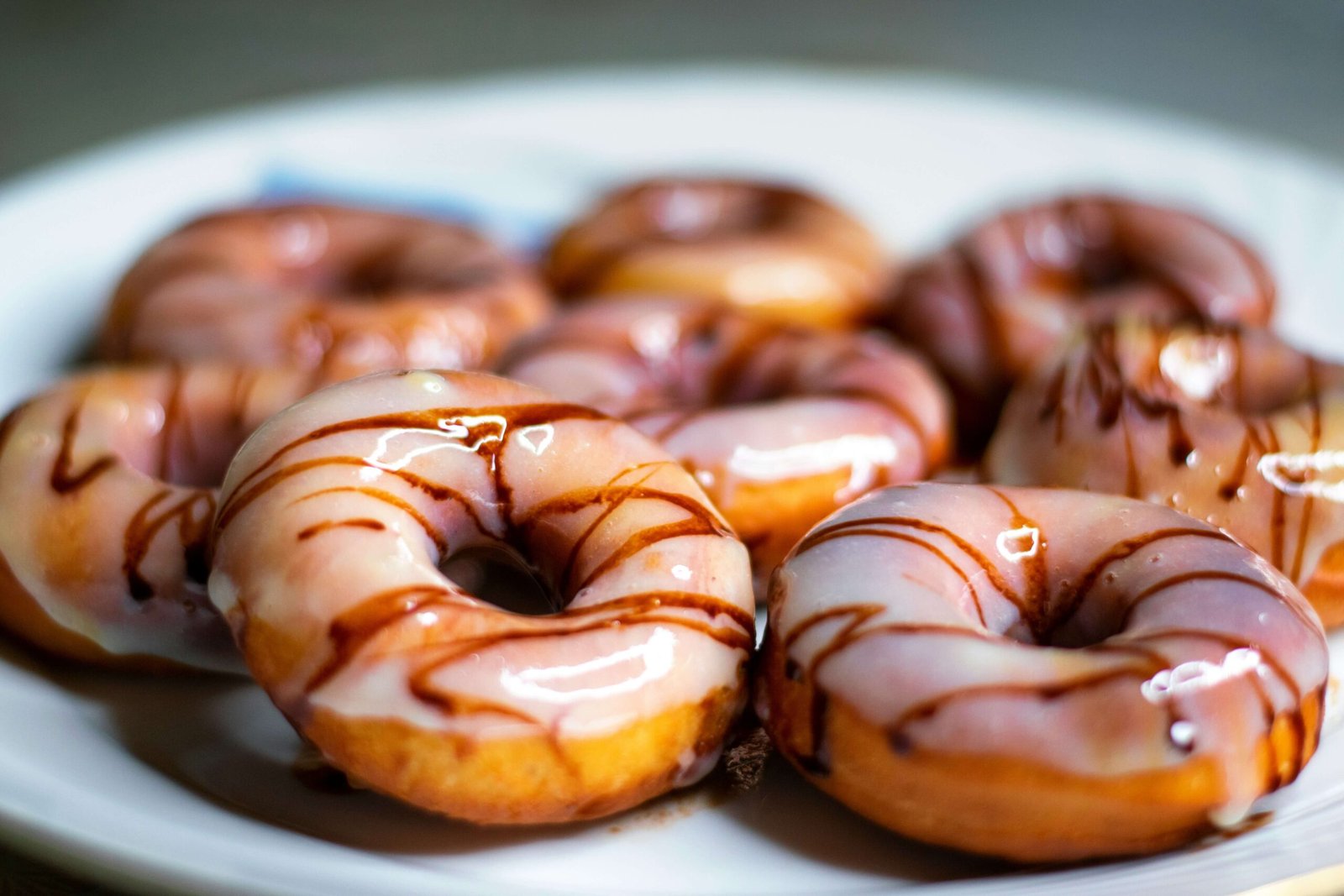 Foods that cause acne — glazed donuts as high-sugar refined carbs linked to insulin and IGF-1